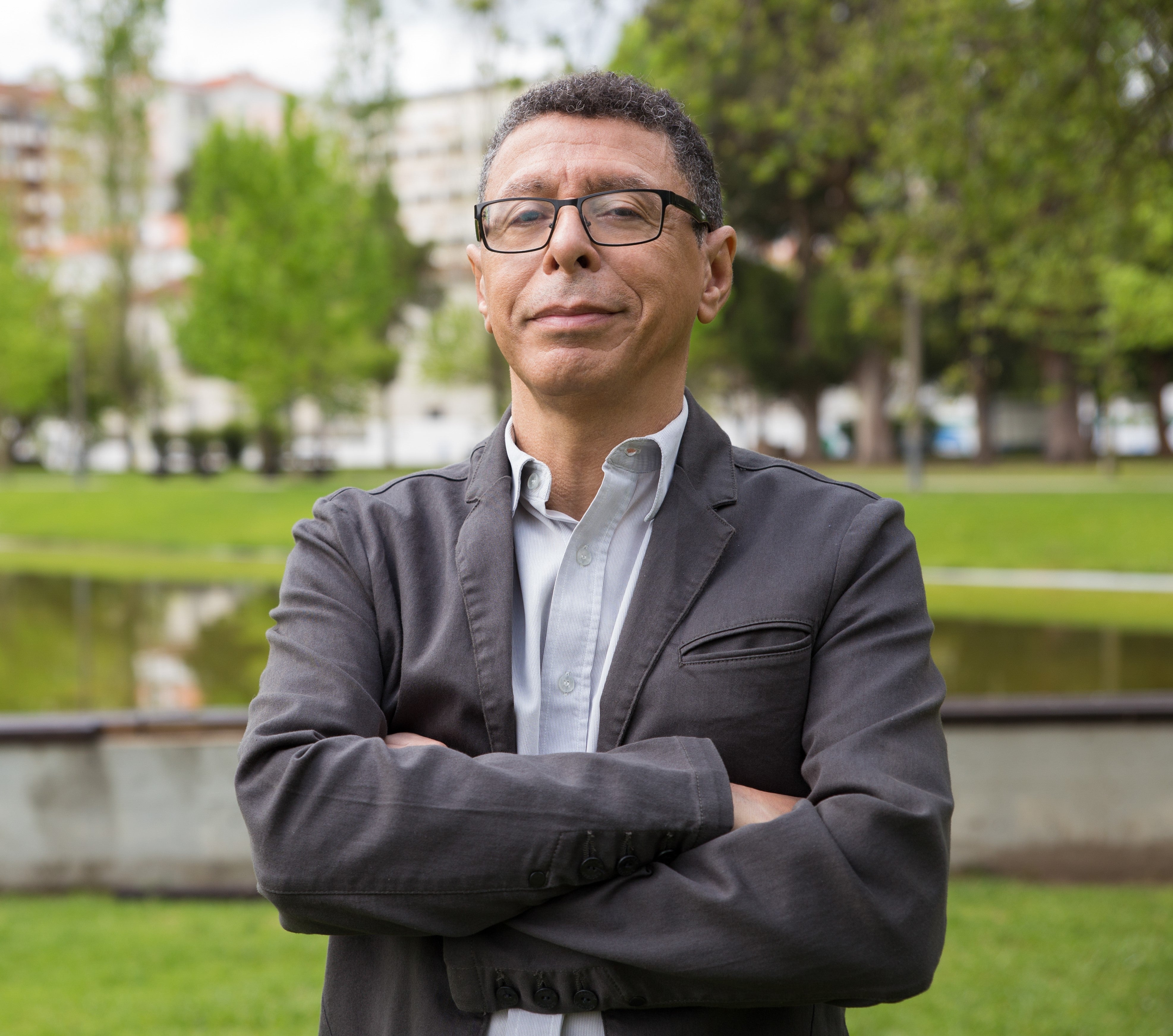 files/smiling-middle-aged-man-posing-camera-standing-park_2a631dae-bd68-48cb-be51-868b8166c322.jpg